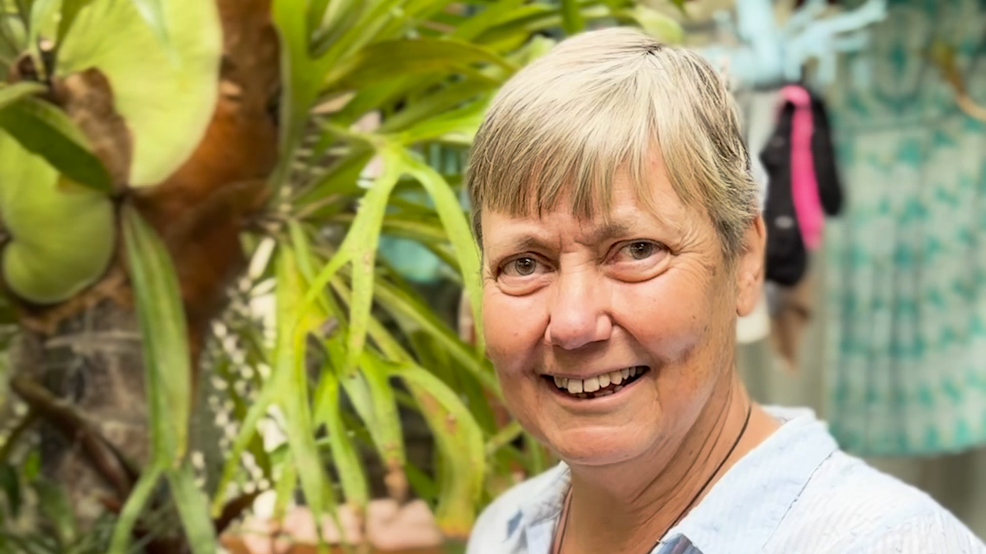 Ruth Carter in her garden, where she grows her own plants