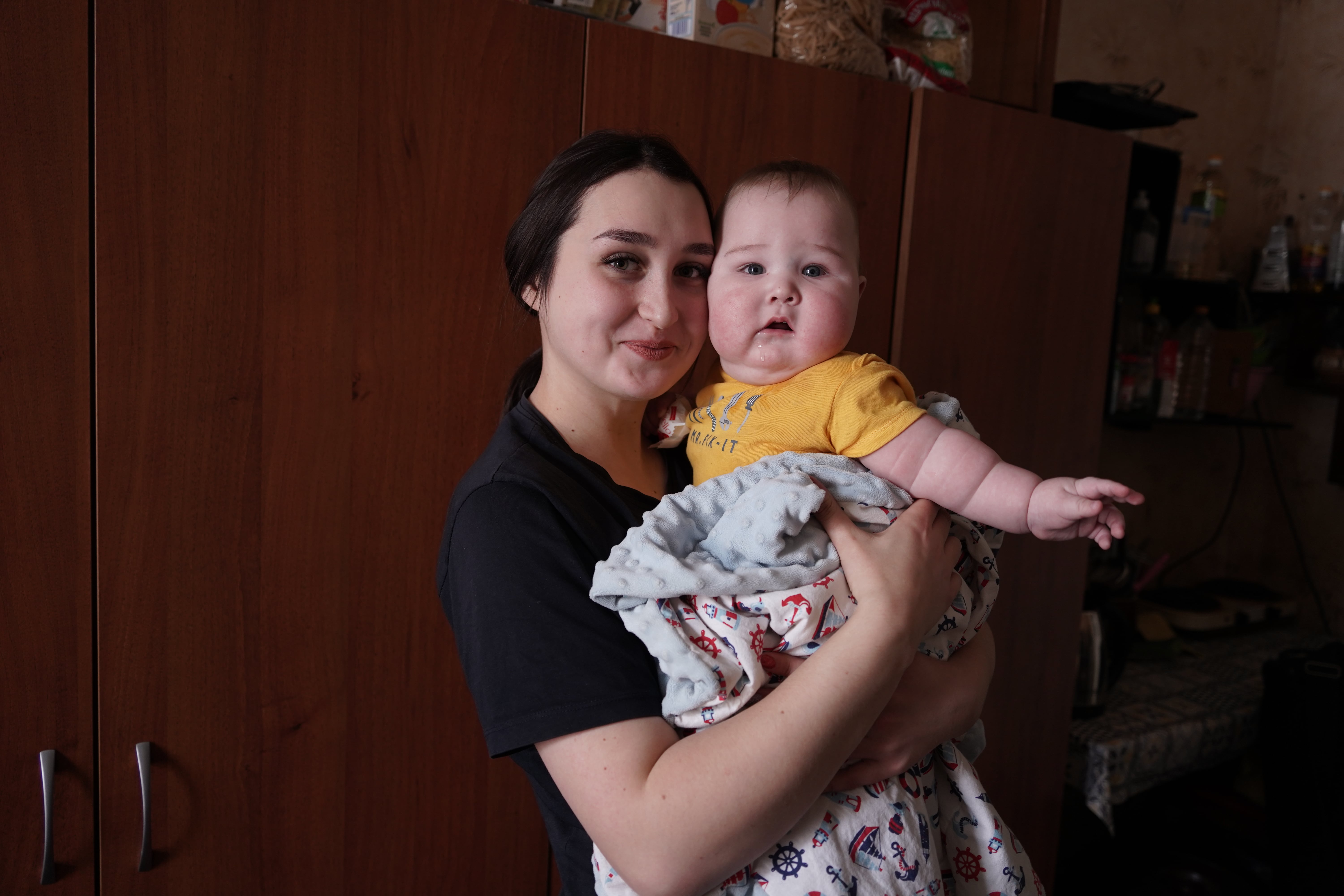 Young family in Lypkuvativka collective site 